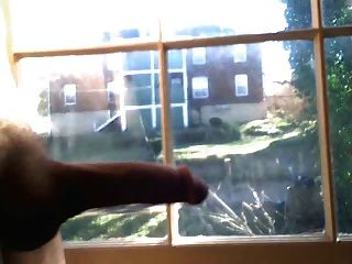 masterbating في نافذة الجيران